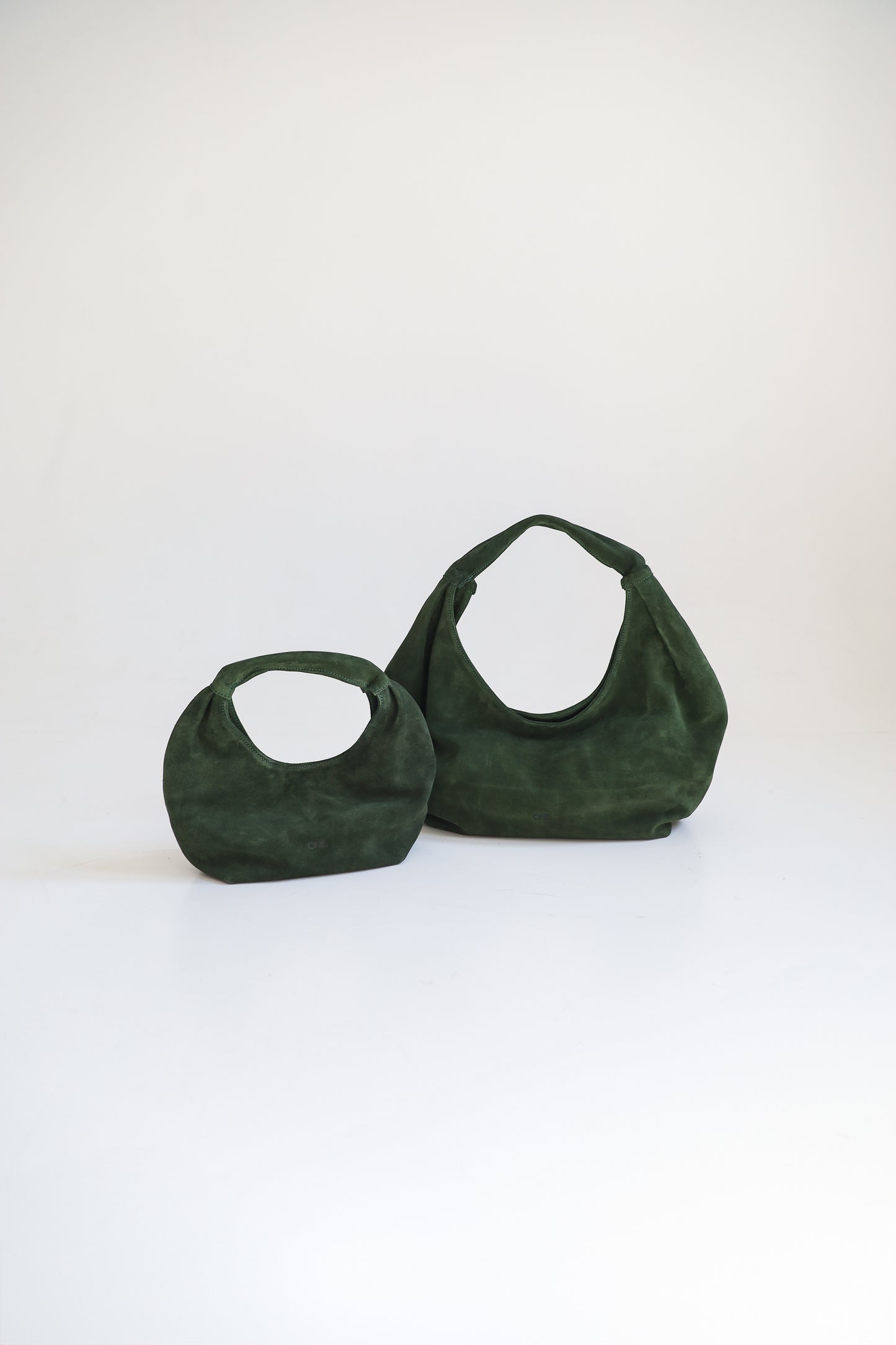 ONE. HASE midi green suede