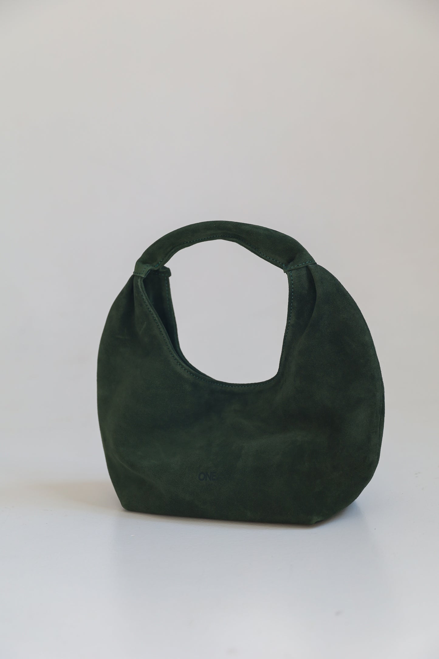 ONE. HASE midi green suede