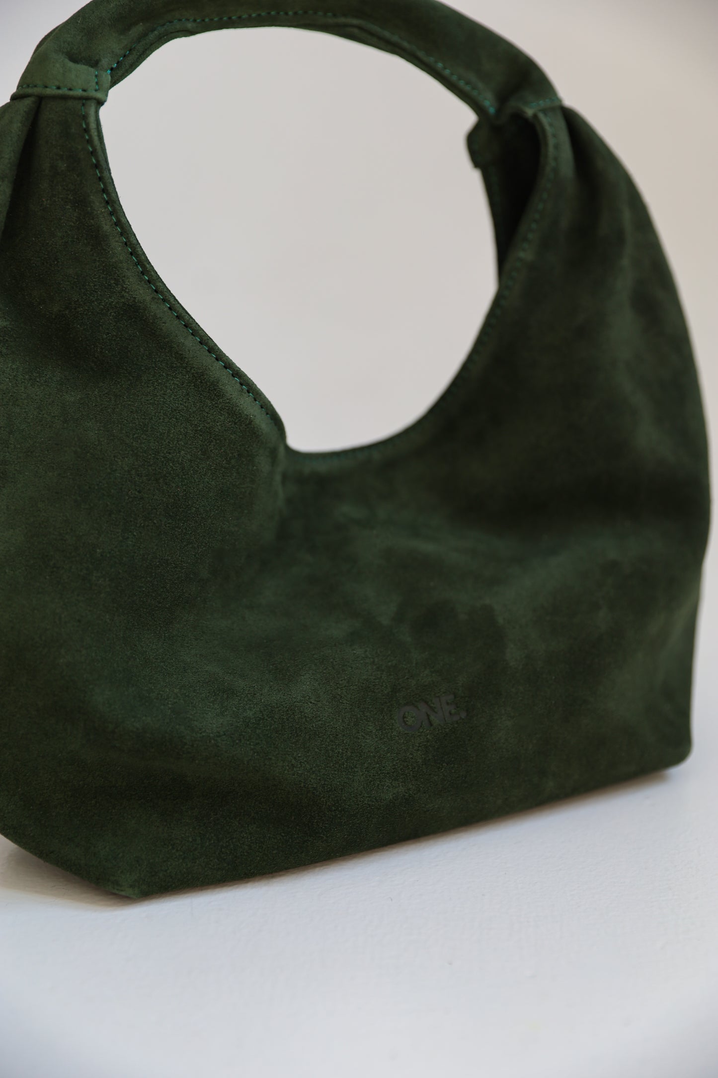 ONE. HASE midi green suede