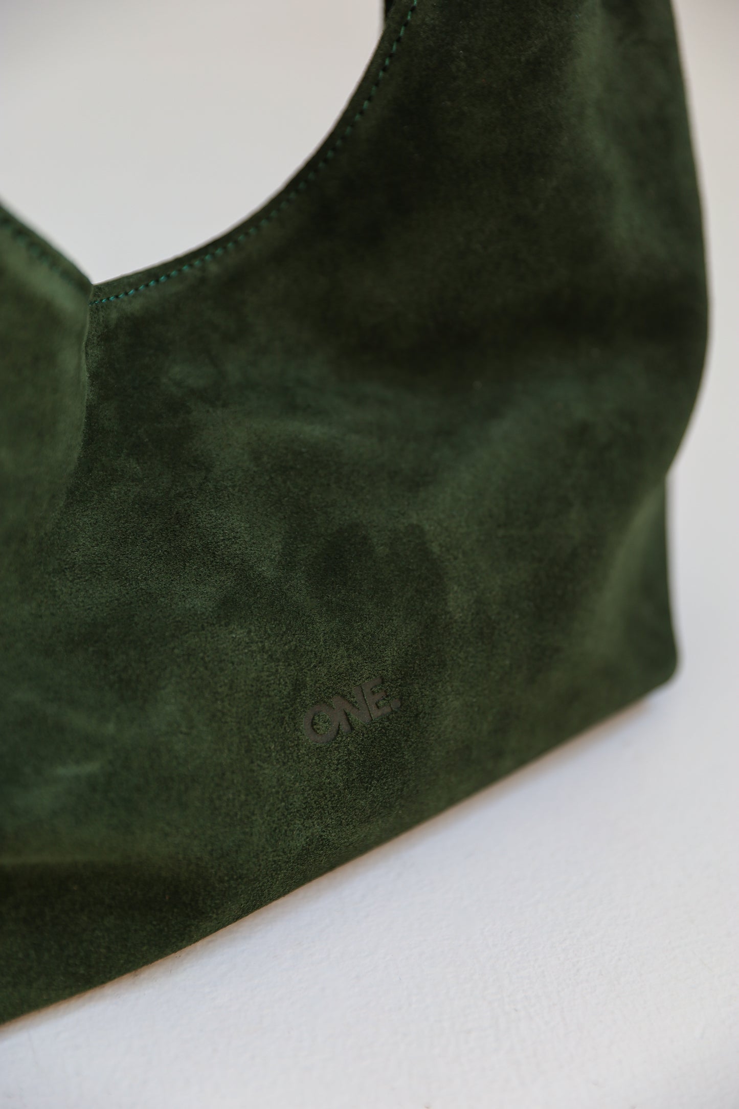 ONE. HASE midi green suede