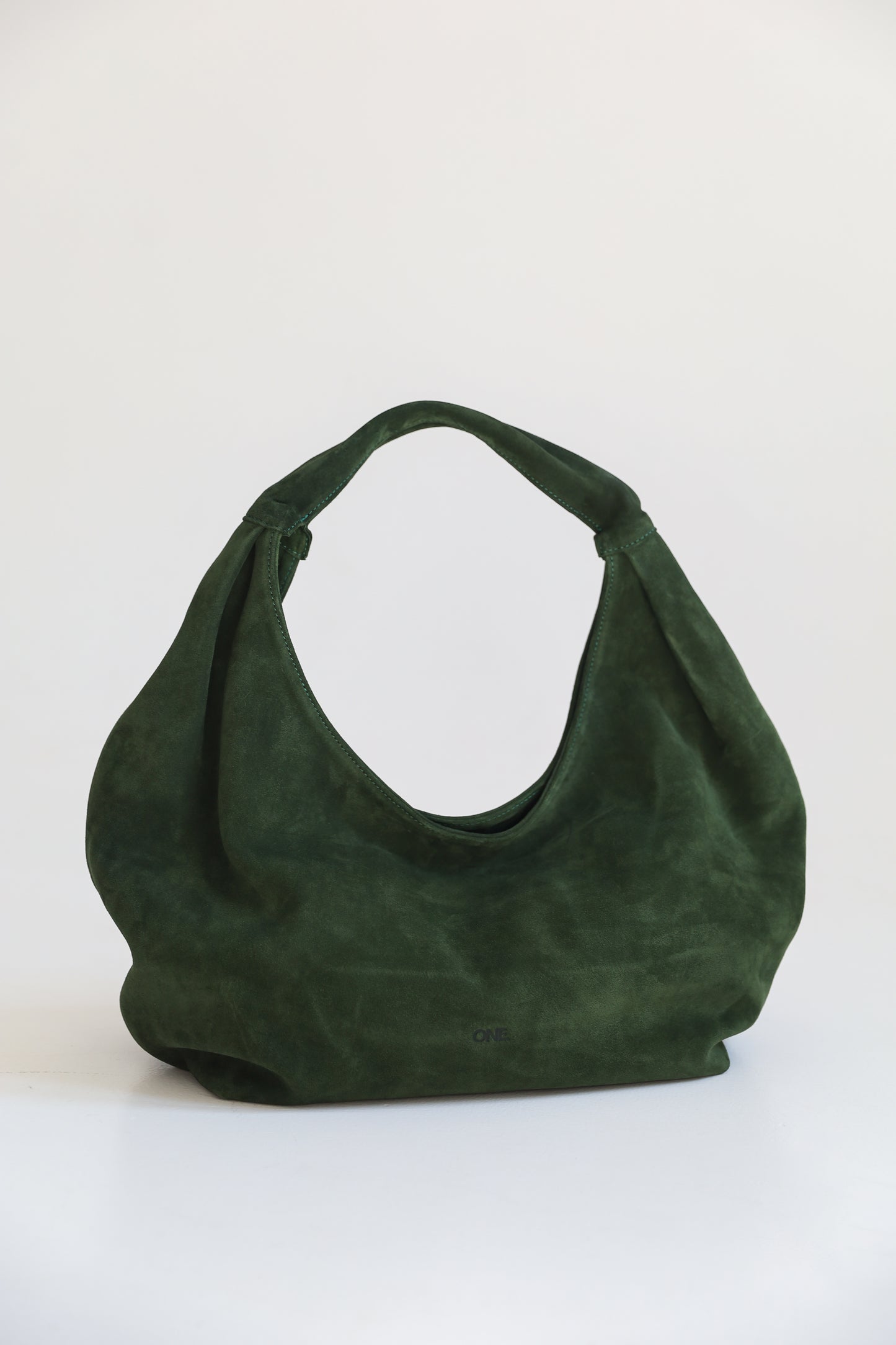 ONE. HASE maxi green suede