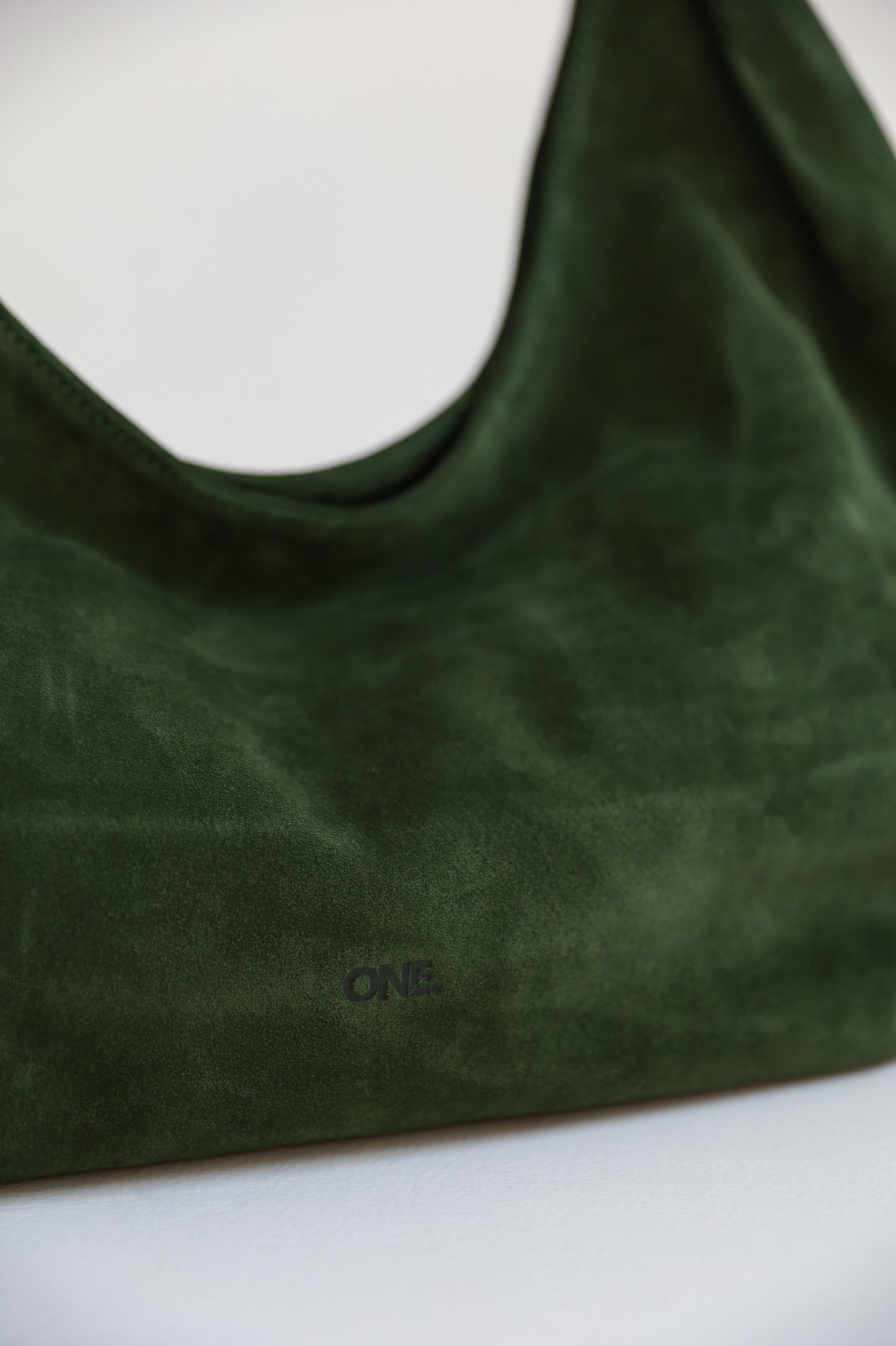 ONE. HASE maxi green suede