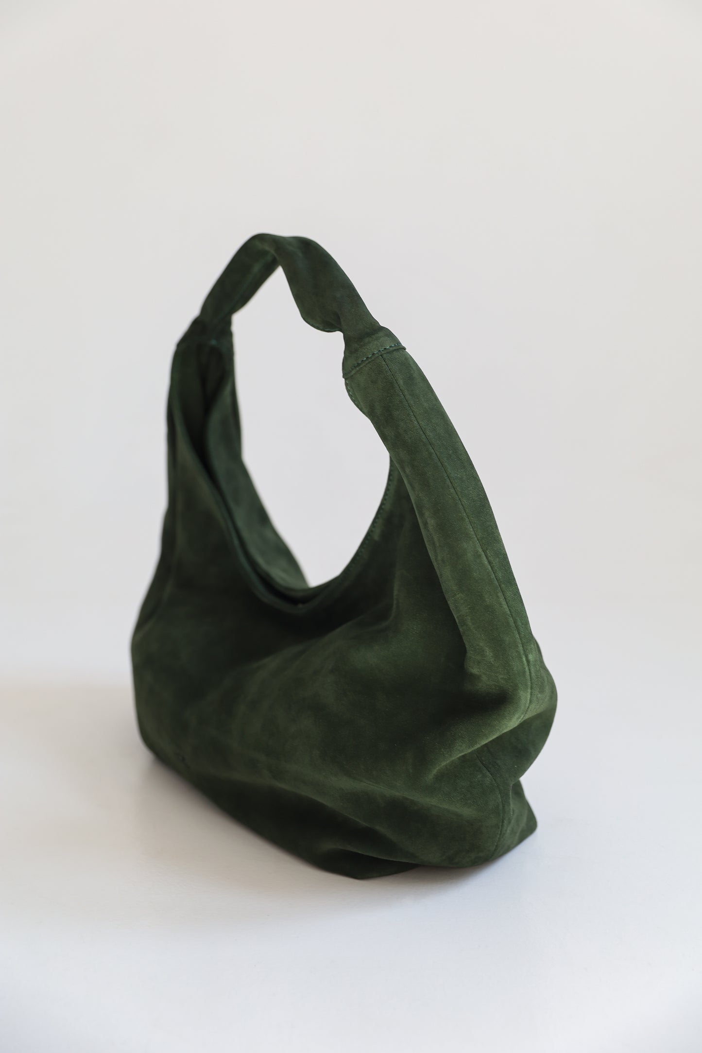 ONE. HASE maxi green suede